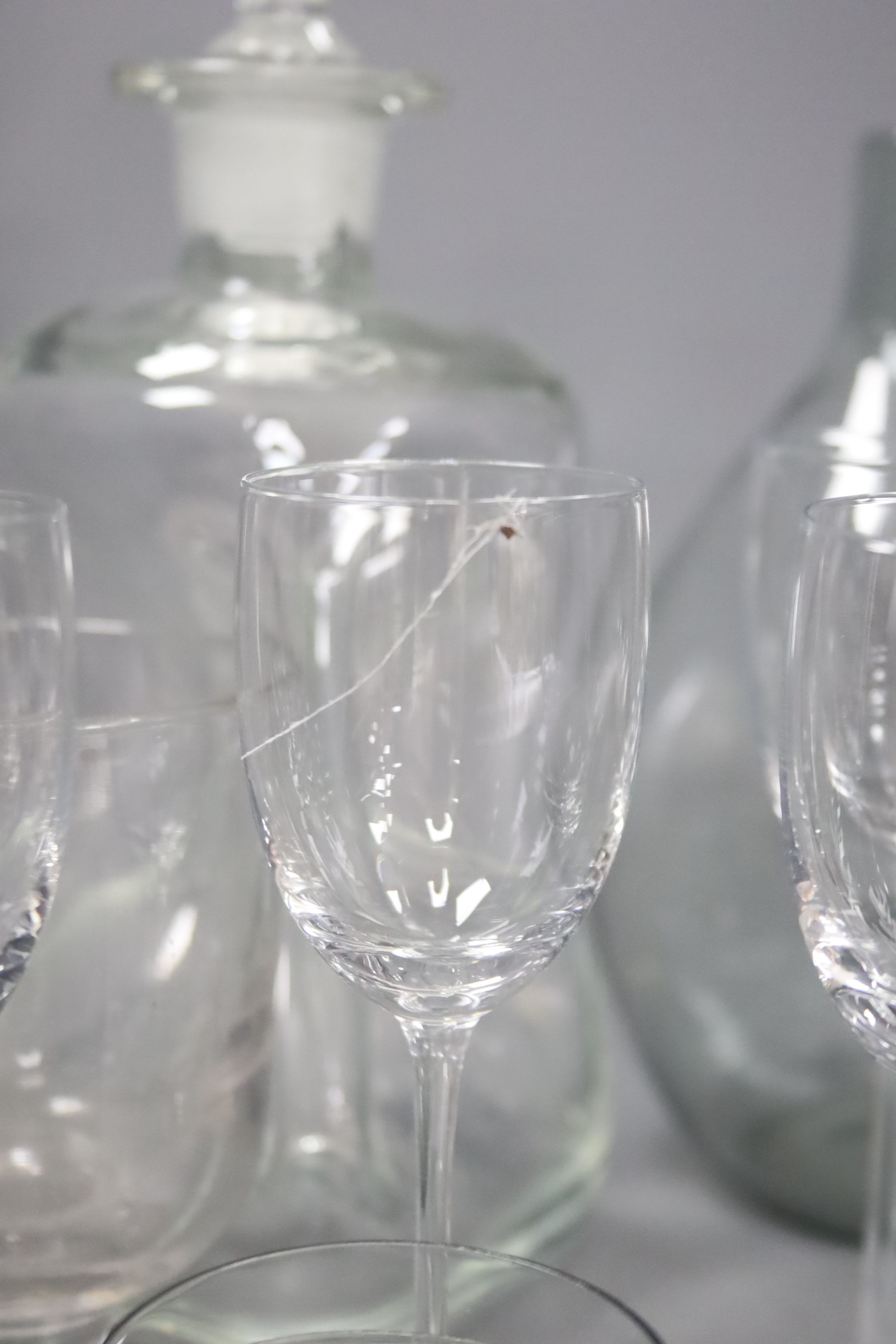 A Swedish glass decanter and glasses, four assorted etched rummers, nine Hadeland Norwegian glasses